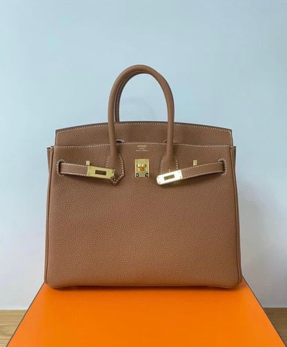 Hermès Kelly 25 Togo Gold Y Stamp